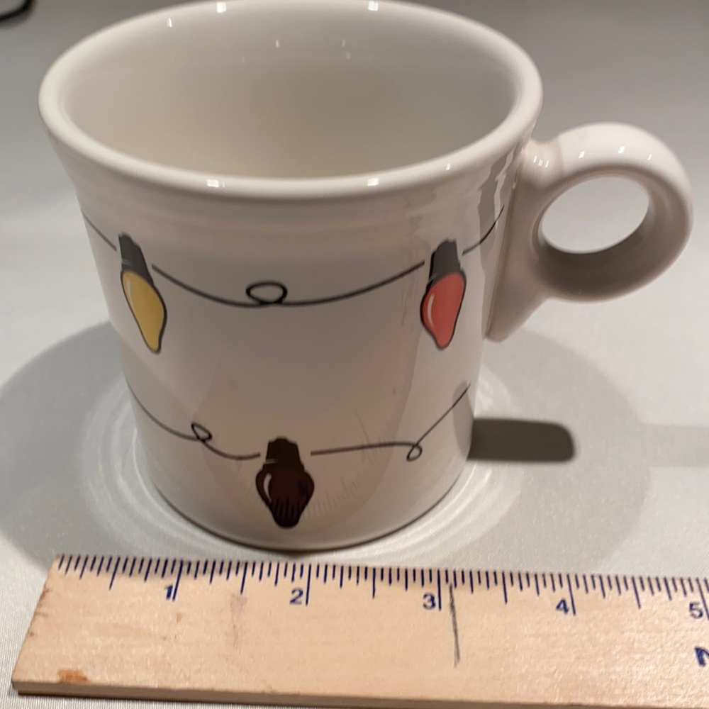 Fiestaware Christmas lights mug made exclusively for Saks. Excellent condition
